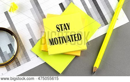 Stay Motivated Text On A Sticky On Sticky On Chart With Pen