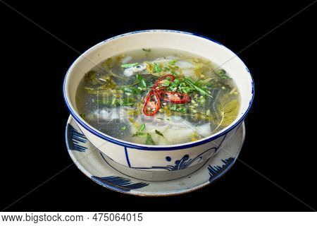 Canh Chua Ca Or Vietnamese Sour Catfish Soup Isolated On Black Background
