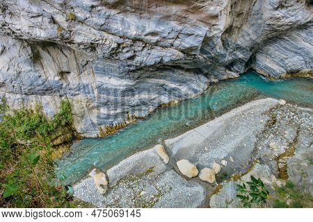 Scenic View Of Swallow Grotto Yanzikou Trail With Narrow Turquoise Liwu River Gorge And High Mountai