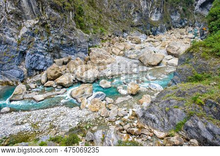 Scenic View Of Swallow Grotto Yanzikou Trail With Narrow Turquoise Liwu River Gorge And High Mountai