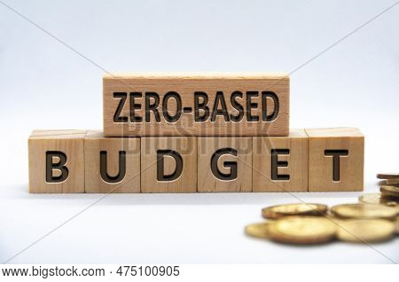 Zero-based Budget Text Engraved On Wooden Blocks On White Background Cover. Business And Budgeting C