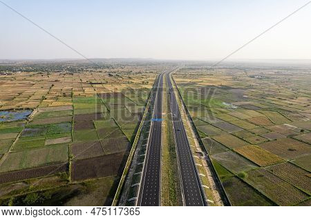 Orbit Aerial Drone Shot Of New Delhi Mumbai Jaipur Express Elevated Highway Showing Six Lane Road Wi