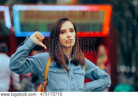 Unhappy Girlfriend Showing Thumbs Down For Negative Response