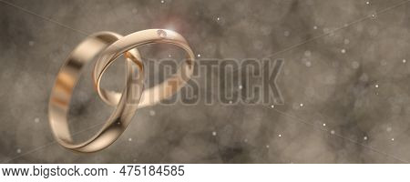 Gold Wedding Rings For The Wedding Of The Newlyweds On A Light Background With Yellow Shiny Bokeh. R