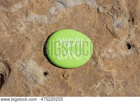 Payday Loans Symbol. Concept Words Payday Loans On Beautiful Green Stone. Beautiful Stone Background
