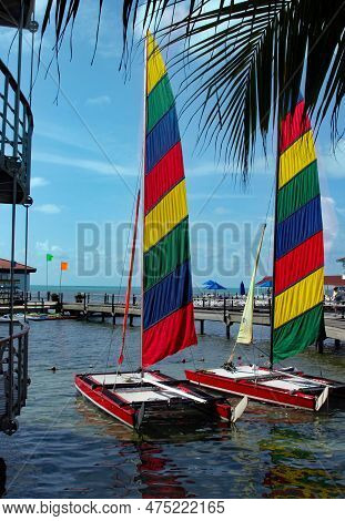 Colorful Sailboats Docked In A Pier At The Caribbean Sea