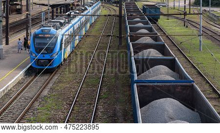 Bialogard, West Pomeranian - Poland - 2022: Regional Train And Freight Train At The Railway Station