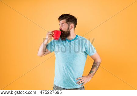 Hipster Tastes And Aesthetics. Energy Concept. Hipster Barista Yellow Background. Coffee Shop. Beard