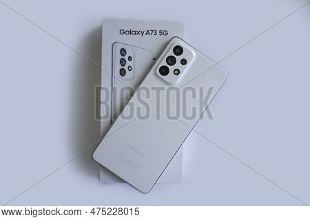 April 22, 2023 Ukraine City Kyiv Smartphone Samsung Galaxy A 73 On A Colored Background
