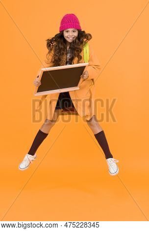 Free After School. Stylish Schoolgirl Blackboard. Copy Space For Ad. Happy Pupil Kid Jumping. Back T