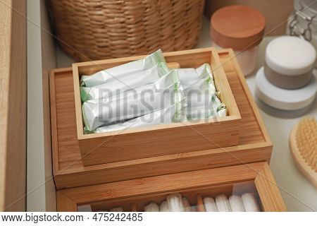 Keeping Tampons And Other Self Care Products In Drawer, Closeup