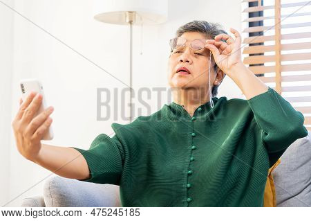 Presbyopia, Hyperopia Mature Asian Woman Holding Eyeglasses Having Problem With Vision Problem Tryin