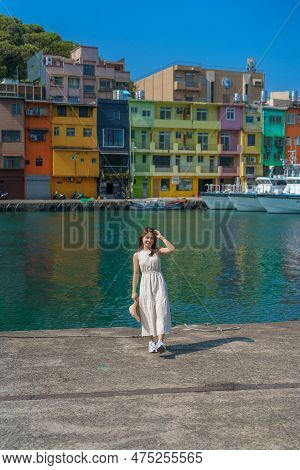 Woman Traveler Visiting In Taiwan, Tourist With Hat Sightseeing In Keelung, Colorful Zhengbin Fishin