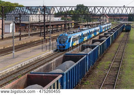 Bialogard, West Pomeranian - Poland - 2022: Regional Train And Freight Train At The Railway Station