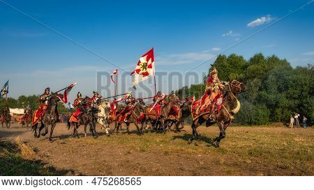 Gniew, Poland, Aug 2020 Castellan On A Horse Leading The Charge Of Hussars, Polish Cavalry, On Enemy