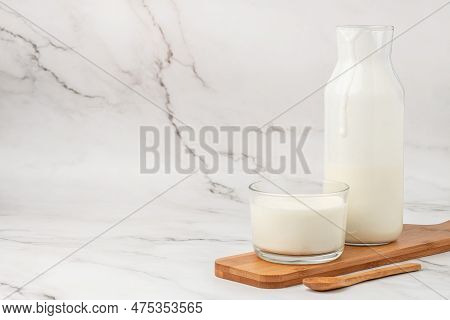 Homemade Yogurt, Kefir, Fermented Milk On A Light Background. Healthy, Clean Eating. Vegan Or Gluten
