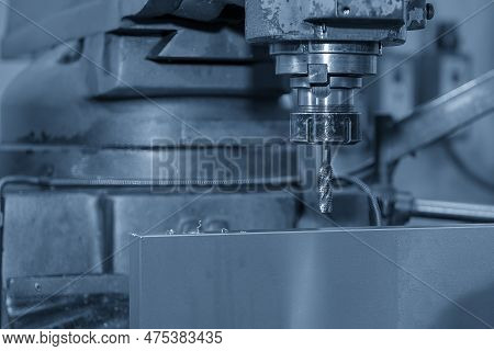 The Tapping Process On Nc Milling Machine In The Light Blue Scene. The Metal Working Concept On The 