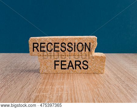 Recession Fears Symbol. Concept Words Recession Fears On Wooden Blocks On A Beautiful Dark Blue Back