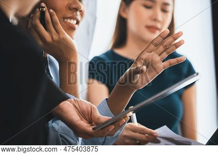 Diverse Business People Work Together, Discuss In Corporate Office. Professional Teamwork Discussing