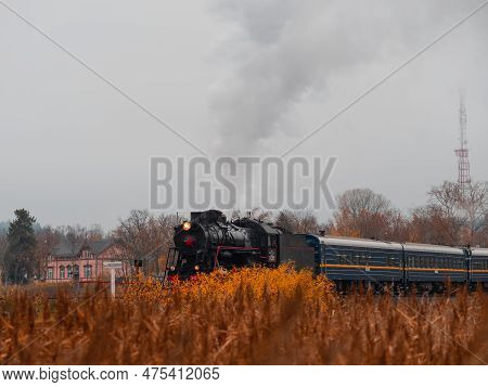 Karelia, Russia - October 10, 2021: Vintage Soviet Steam Train Locomotive. Karelian Express, Autumn 