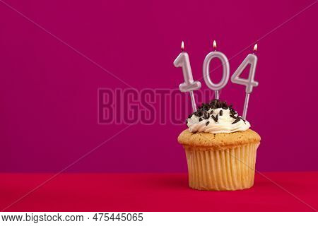 Candle Number 104 - Cake Birthday In Rhodamine Red Background