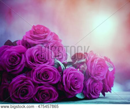 Close Up Beautiful Pink Roses Bouguet With Glowing Light Background