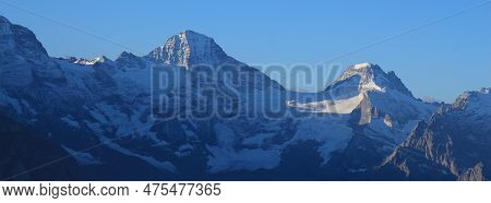 Mountains In The Lauterbrunnen Valley At Sunrise.