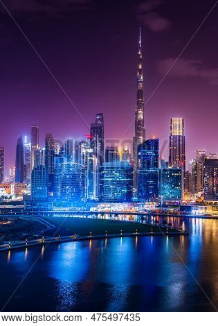 Night View Of The Illuminated Skyline Of The Downtown District Of Dubai From Apartment In Business B