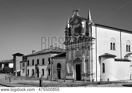 Facade Of The Historic Chiesa Di San Lorenzo Church In The Town Of Vo, Italy, Monochrome