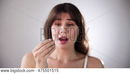 Hairfall And Hairloss. Worried Woman With Hair Loss
