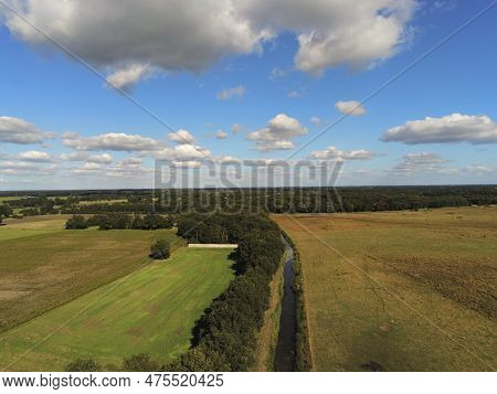 Stream Along The Fields, Meadows And Through The Forest