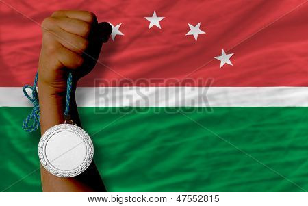 เหรียญเงินกีฬาและธงชาติของ Maghreb