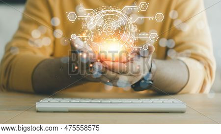 Man Holding Global Network And Brain Icons With The Idea Of E-learning Technology, Online Courses. A