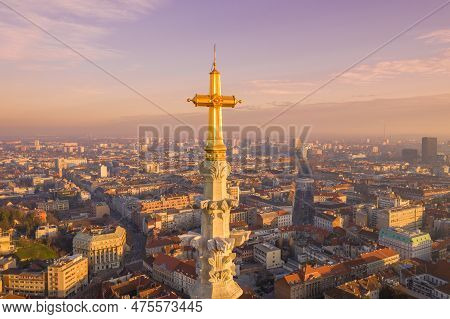 Golden Cross Of Zagreb Cathedral In Croatia. It Is On The Kaptol, Is A Roman Catholic Institution An