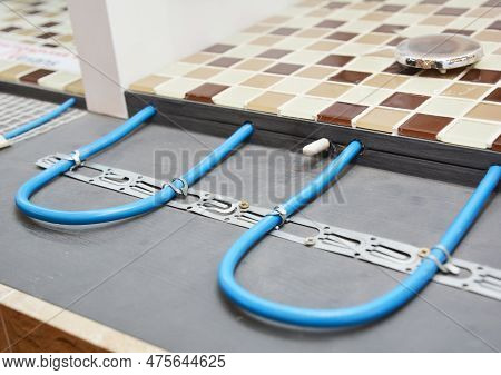 Electric Radiant Flooring Installation Concept. Installing Radiant Heat Flooring Or Heated Floor Sys