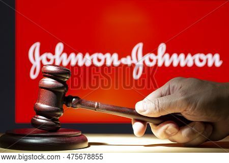 Syktyvkar, Komi, Russia, May 1, 2023, Johnson And Johnson, Concept. A Court Hammer On The Background