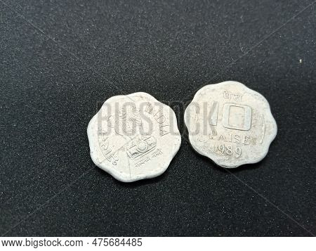 Indian Old Silver Colour (10 Paise) Coin Isolated On Black Background