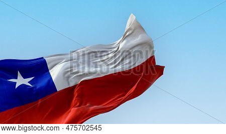 Chile National Flag Fluttering In The Wind On A Sunny Day. The Chilean Flag Is Red And White With A 