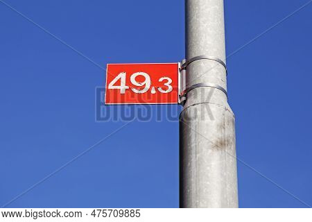 Sign With The Numbers 49.3 At The River