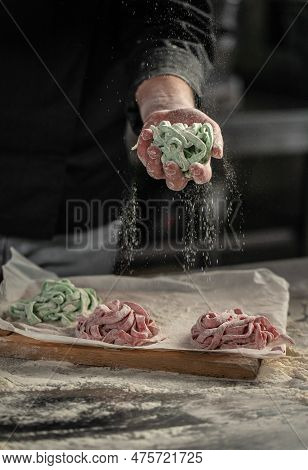Chef Makes Fresh Spaghetti, Fettuccine Or Tagliatelle. Cooking Process.