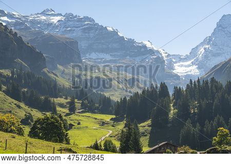 Switzerland Mountain Valley Kiental, Berner Oberland Alps. Snow Mountains, Sunny Weather, Travel To 