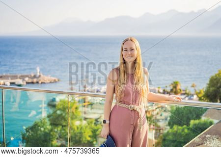 Woman Tourist In Old Town Kaleici In Antalya. Turkiye. Panoramic View Of Antalya Old Town Port, Taur