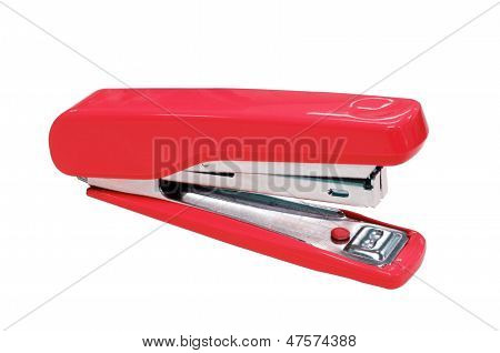 Red stapler isolated on white
