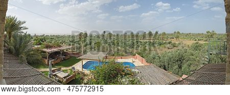 Panoramic View Over Remote African Egyptian Agricultural Farmland With Swimming Pool In Foreground A