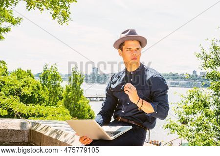 Businessman Traveling, Working In New York. Wearing Blue Collarless Shirt, Fedora Hat, Sunglasses, A