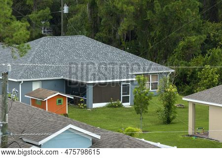 Aerial View Of Typical Contemporary American Private House With Roof Top Covered With Asphalt Shingl
