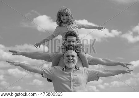 Family Meeting. Father And A Boy Came To See His Grandfather Raising Hands Or Open Arms Flying On Sk