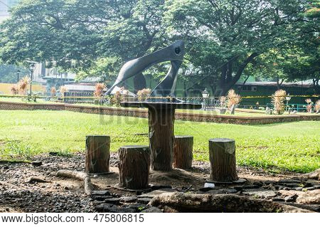 Table And Chairs Under A Tree At The Rizal Park