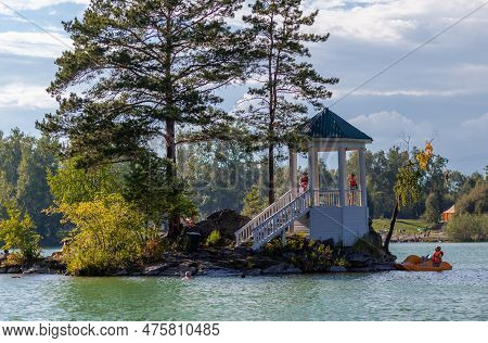 14.08.2022, Altai Republic, Russia. A Small Island On Lake Aya In The Altai Territory Or The Altai R