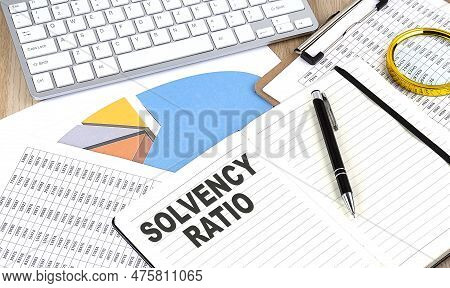 Solvency Ratio Text On Paper On Chart Background